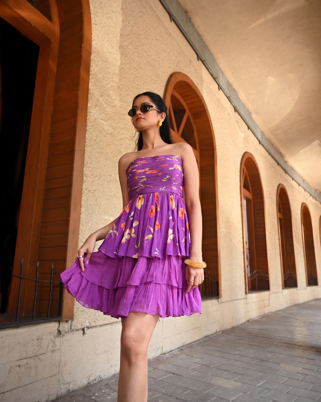 Purple layered short dress with petal details by Simor, featuring a tube neckline and stylish design.