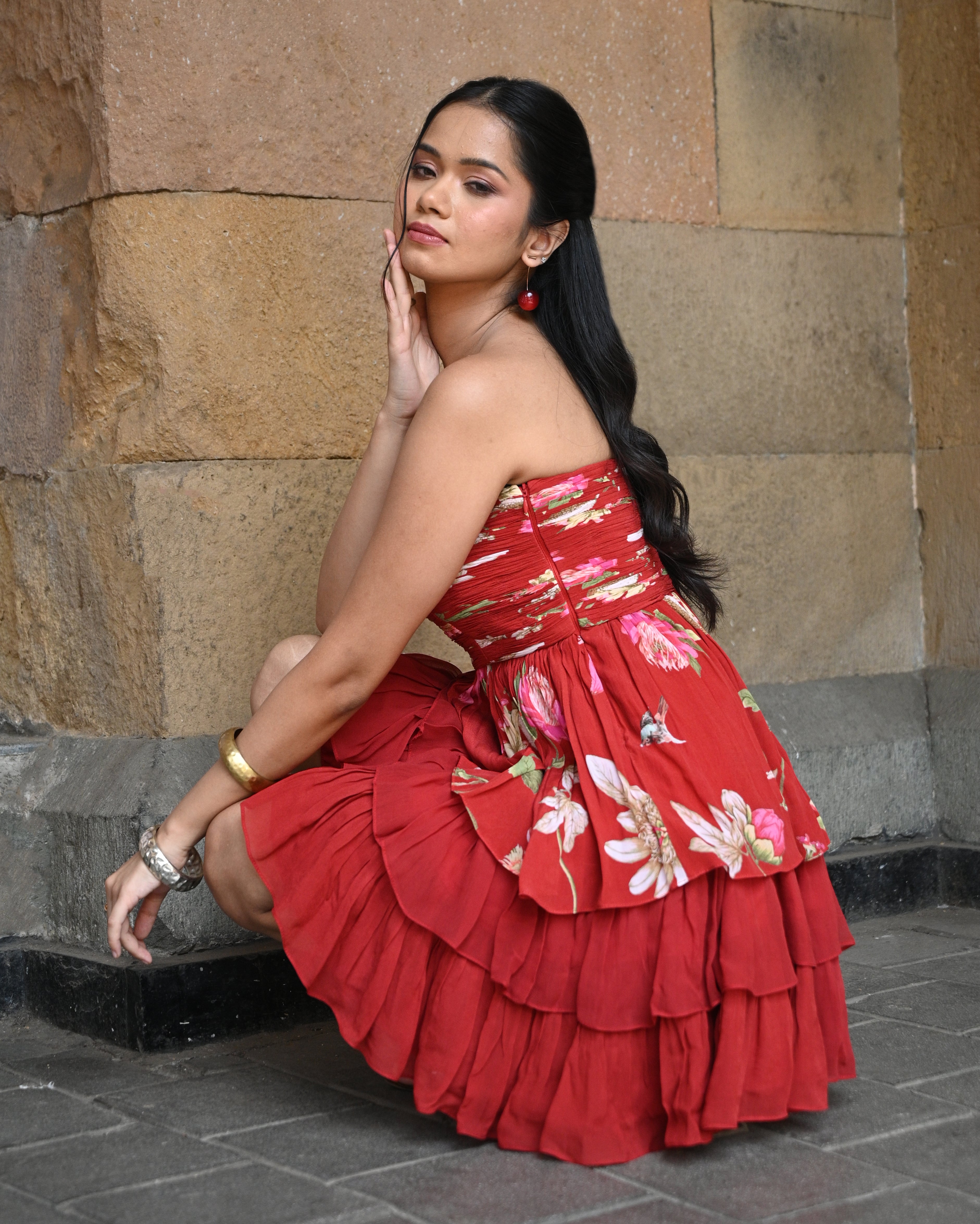 Red layered tube short dress by Simor featuring a fitted bodice and stylish layered skirt for a chic, modern look.