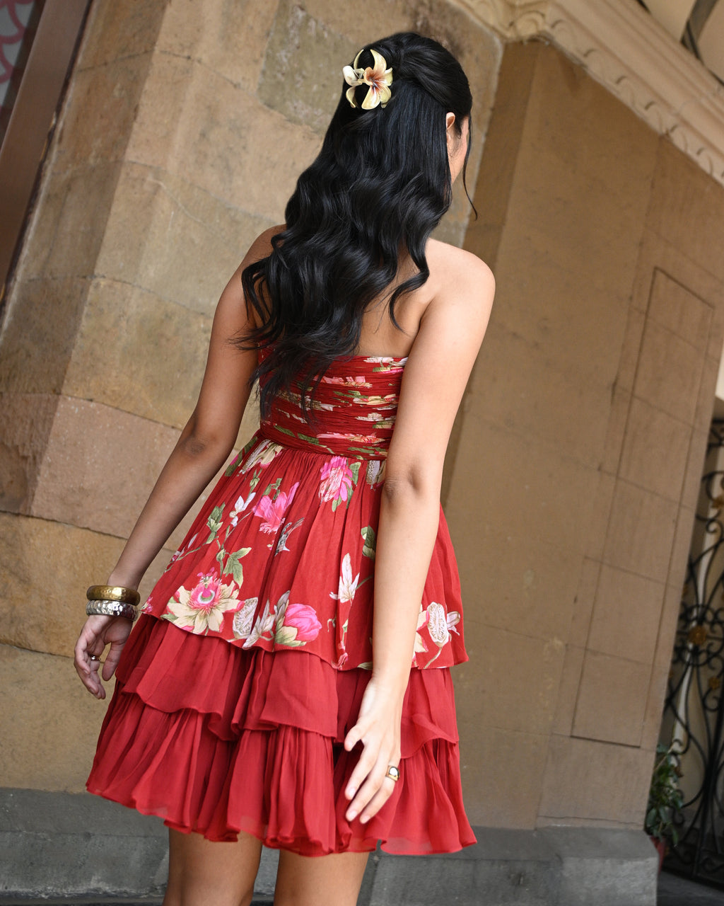 Simor Romance in Red tube layered short dress displayed on a hanger, showcasing its vibrant red color and stylish design.