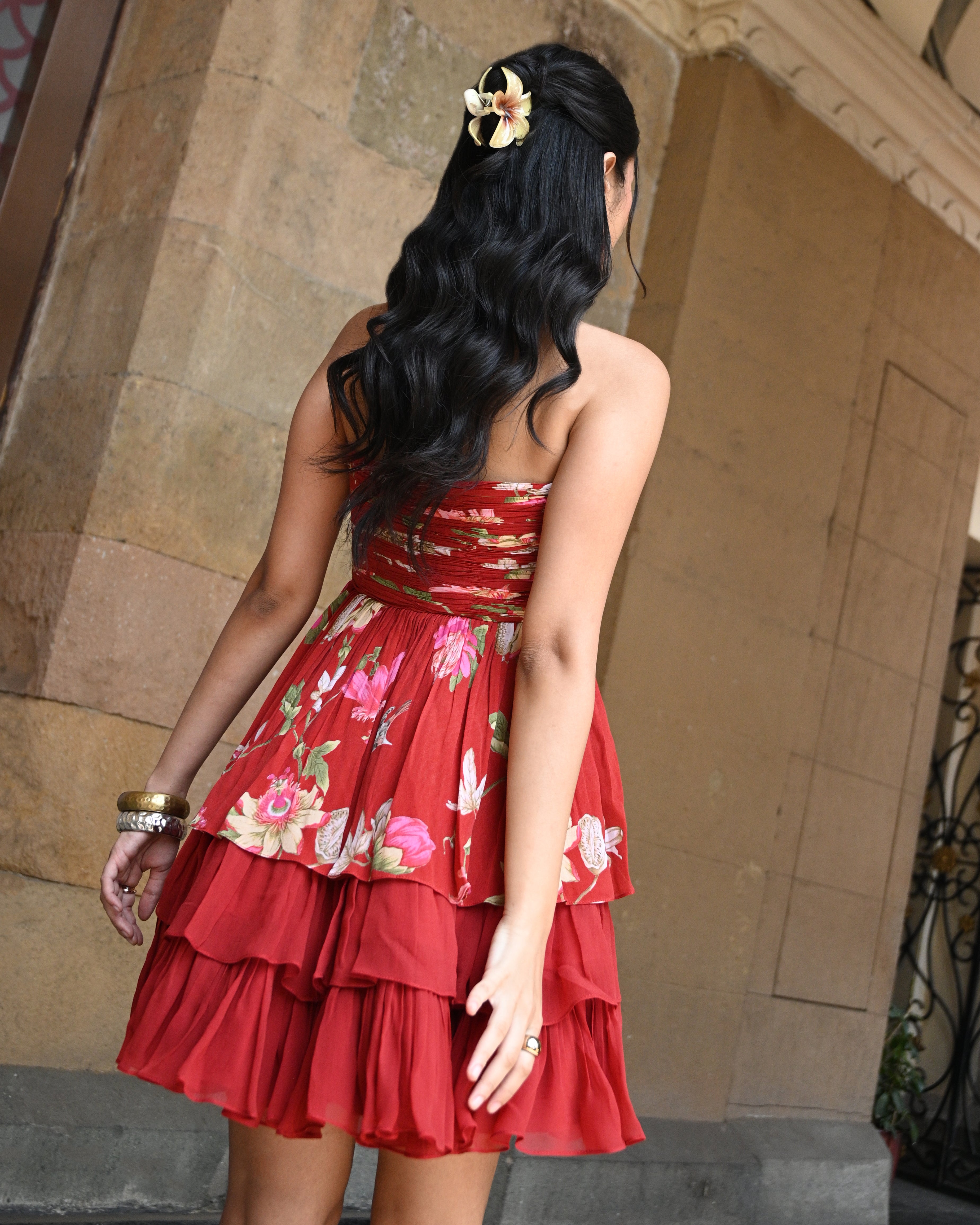 Simor Romance in Red tube layered short dress displayed on a hanger, showcasing its vibrant red color and stylish design.