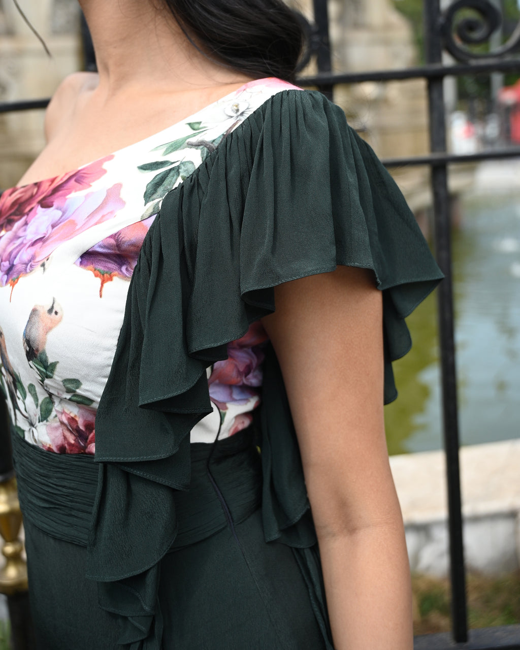 Simor Cascade Dress, one-shoulder short dress with flowing fabric and elegant design, displayed on a mannequin.