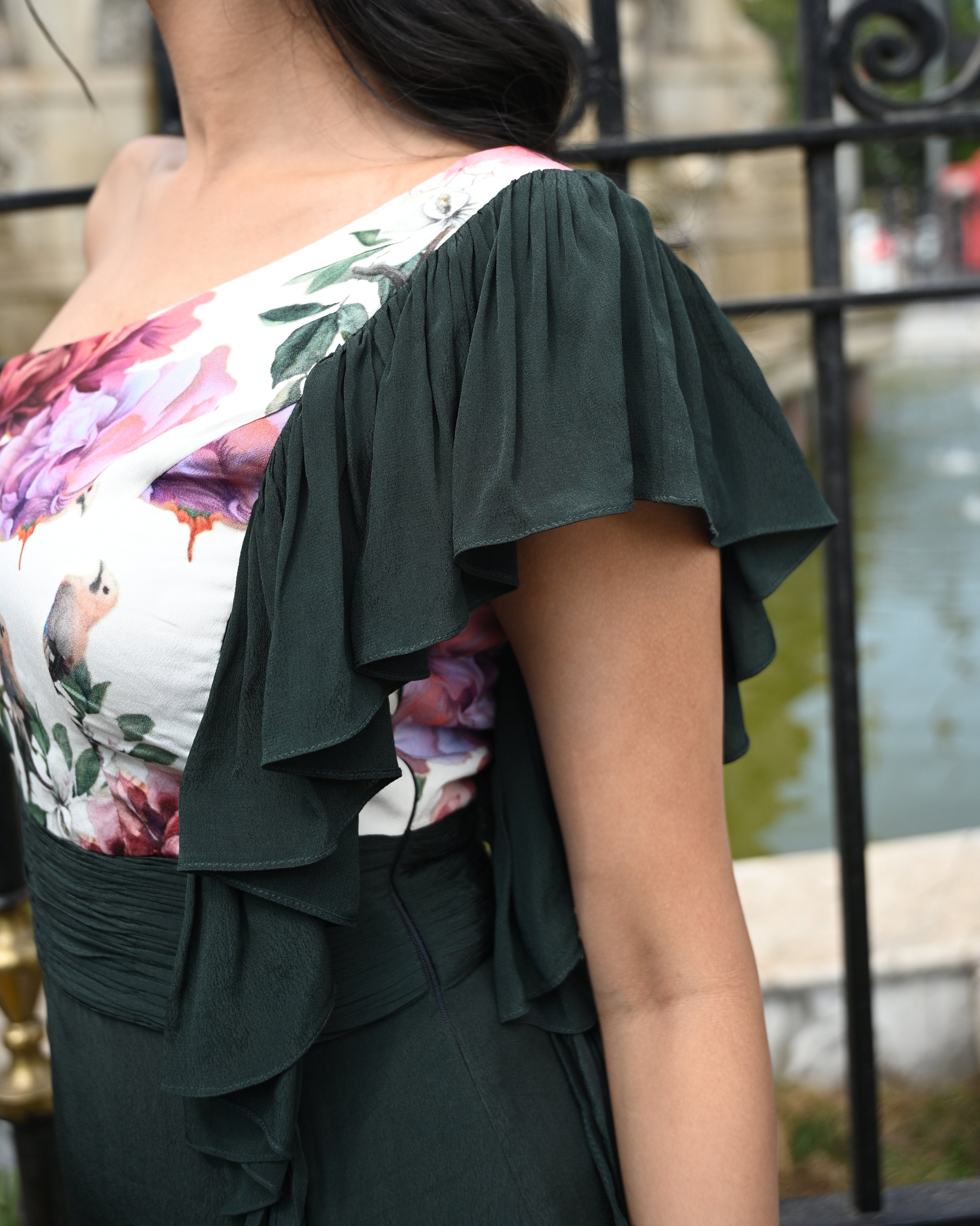 Simor Cascade Dress, one-shoulder short dress with flowing fabric and elegant design, displayed on a mannequin.