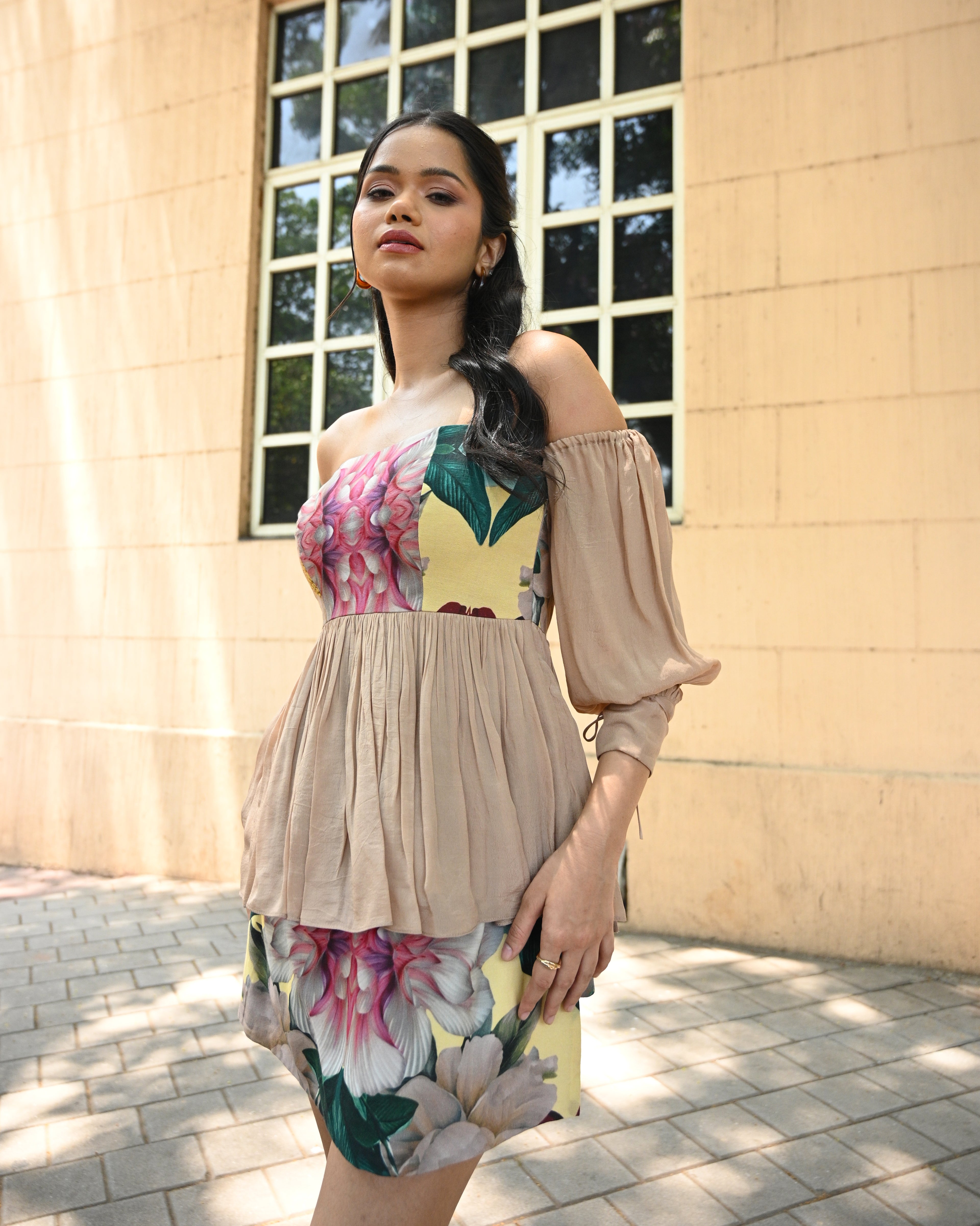 Floral Whisper peplum top and skort coord set by Simor, featuring a bright floral print, lightweight fabric, and stylish design.