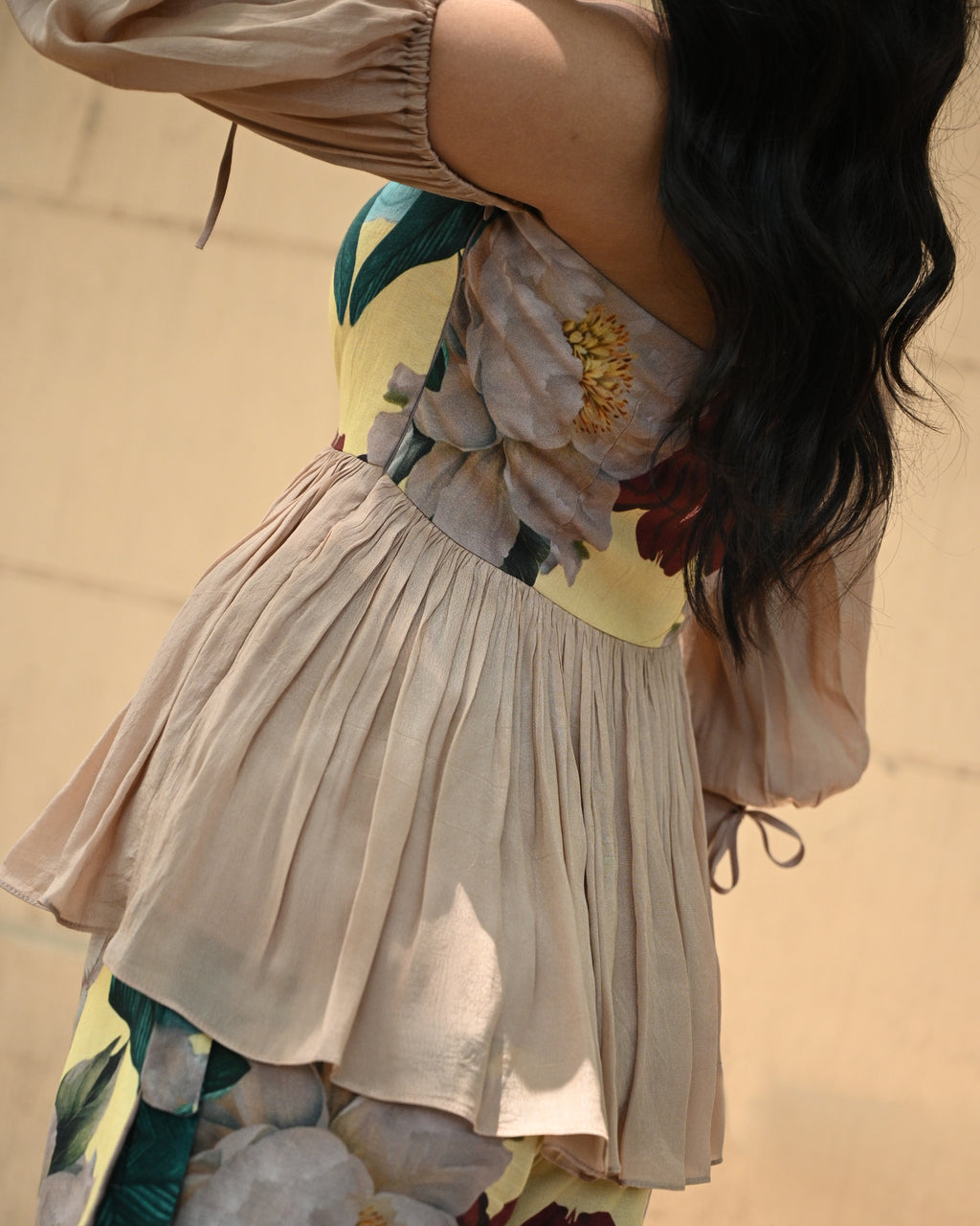 Simor Floral Whisper peplum top and skort coord set, featuring a floral pattern and stylish design, shown on a model.