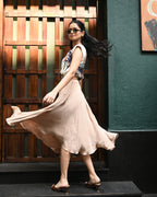 Simor Petal Flounce Dress with back cut-out, midi length, floral design, flowing fabric, perfect for summer or special occasions.
