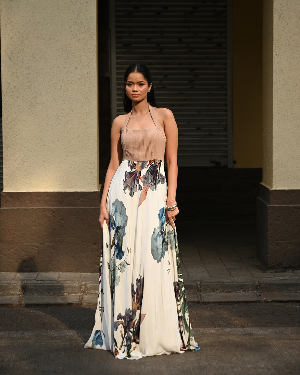 Simor Dessert Bloom Dress, a halter neck maxi dress with floral pattern, flowing fabric, and elegant design.