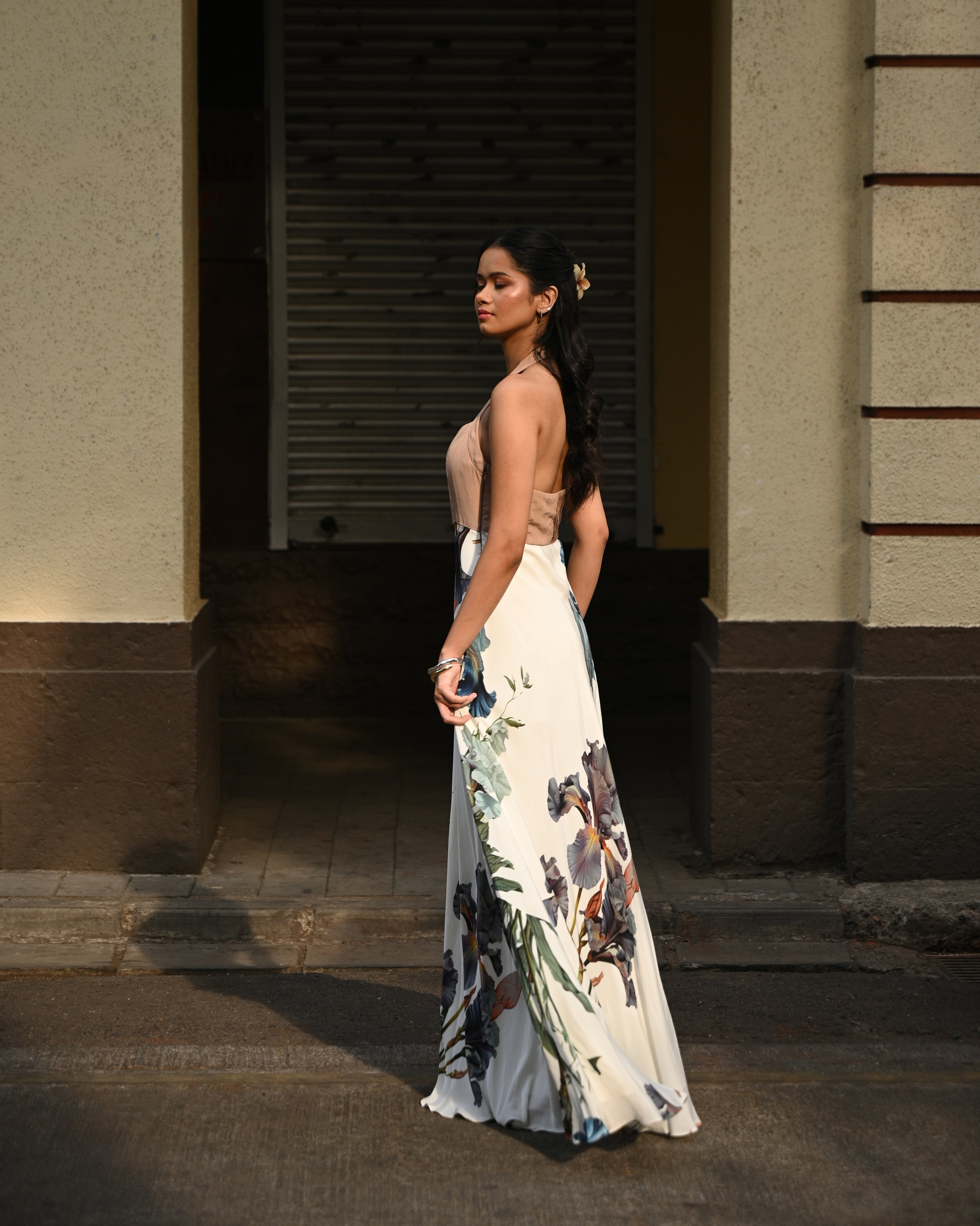 Simor Dessert Bloom halter neck maxi dress with floral pattern and flowing fabric, perfect for elegant summer occasions.