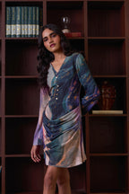 Simor cosmic short dress with draped design and long sleeves, featuring a stylish, celestial-inspired pattern in the image.