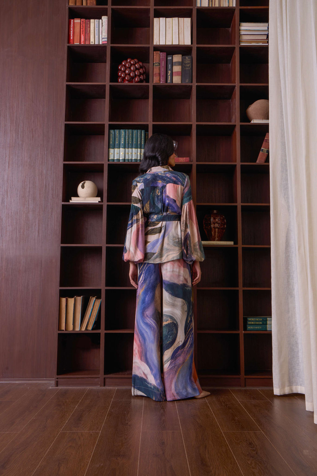 Simor celestial double-breasted co-ord set featuring a stylish shirt and matching pants in a celestial print.