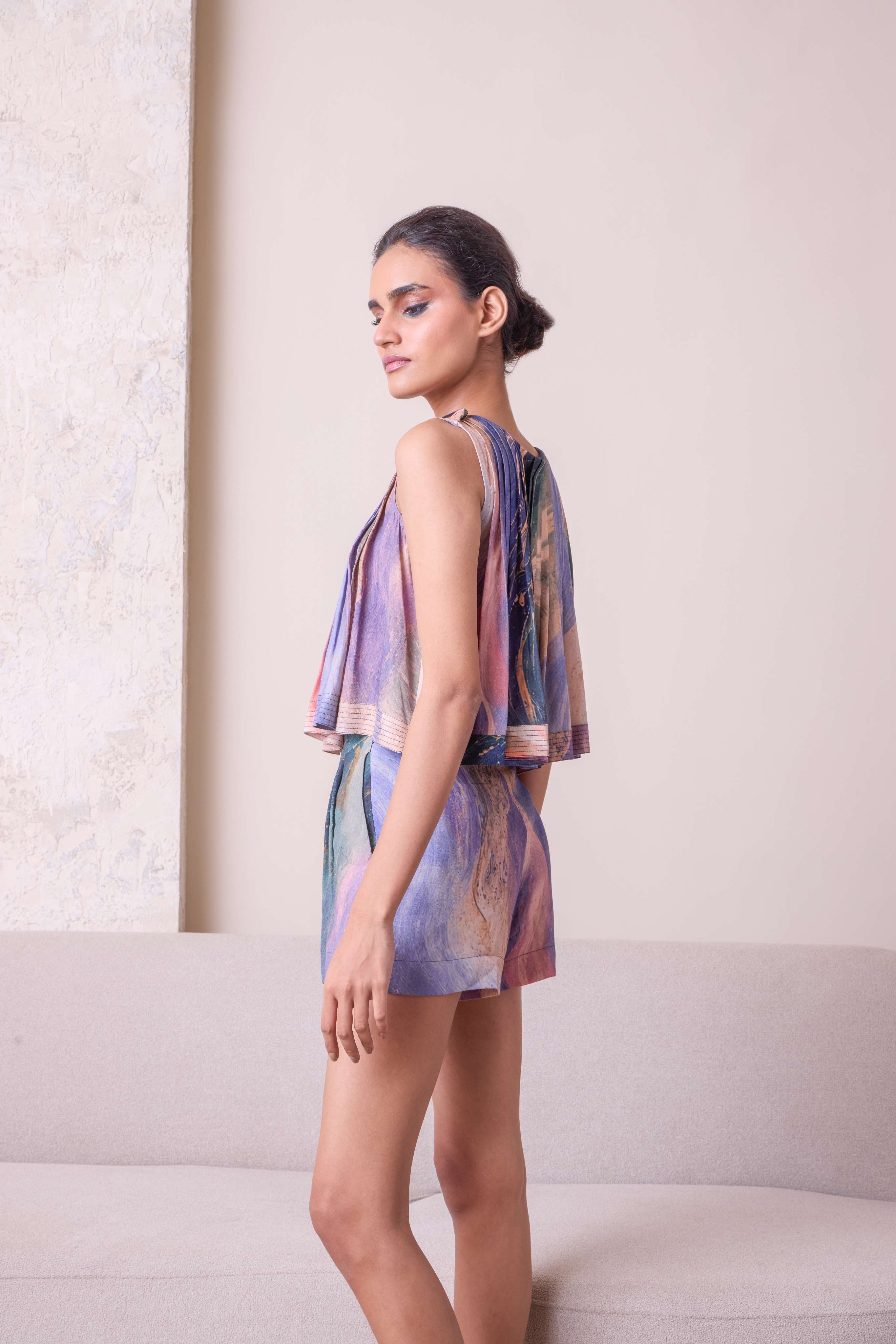 Simor pleated shorts co-ord set with matching top, lightweight fabric, and stylish design perfect for casual summer wear.