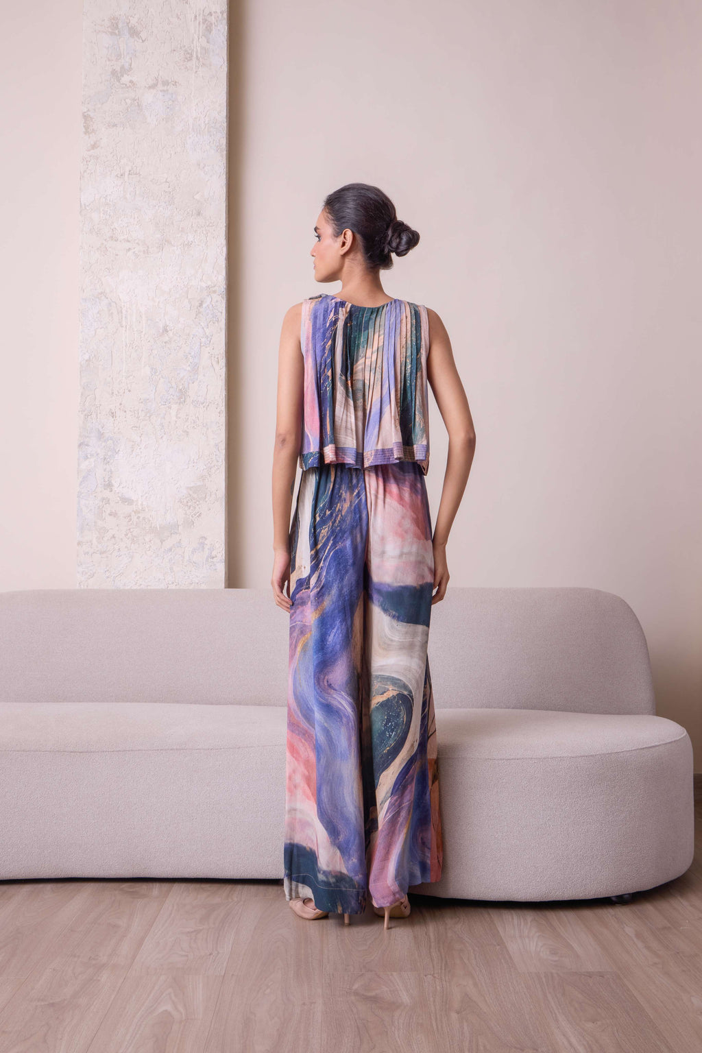 Simor pleated co-ord set featuring a stylish matching top and pants, perfect for casual or chic occasions.