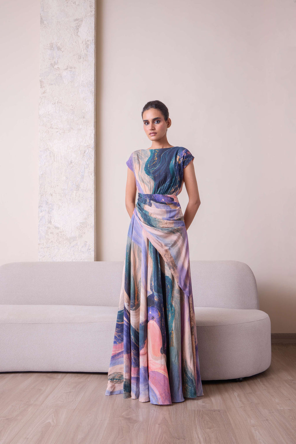 Celestial waist-draped gown by Simor featuring flowing fabric and elegant design, perfect for formal occasions.