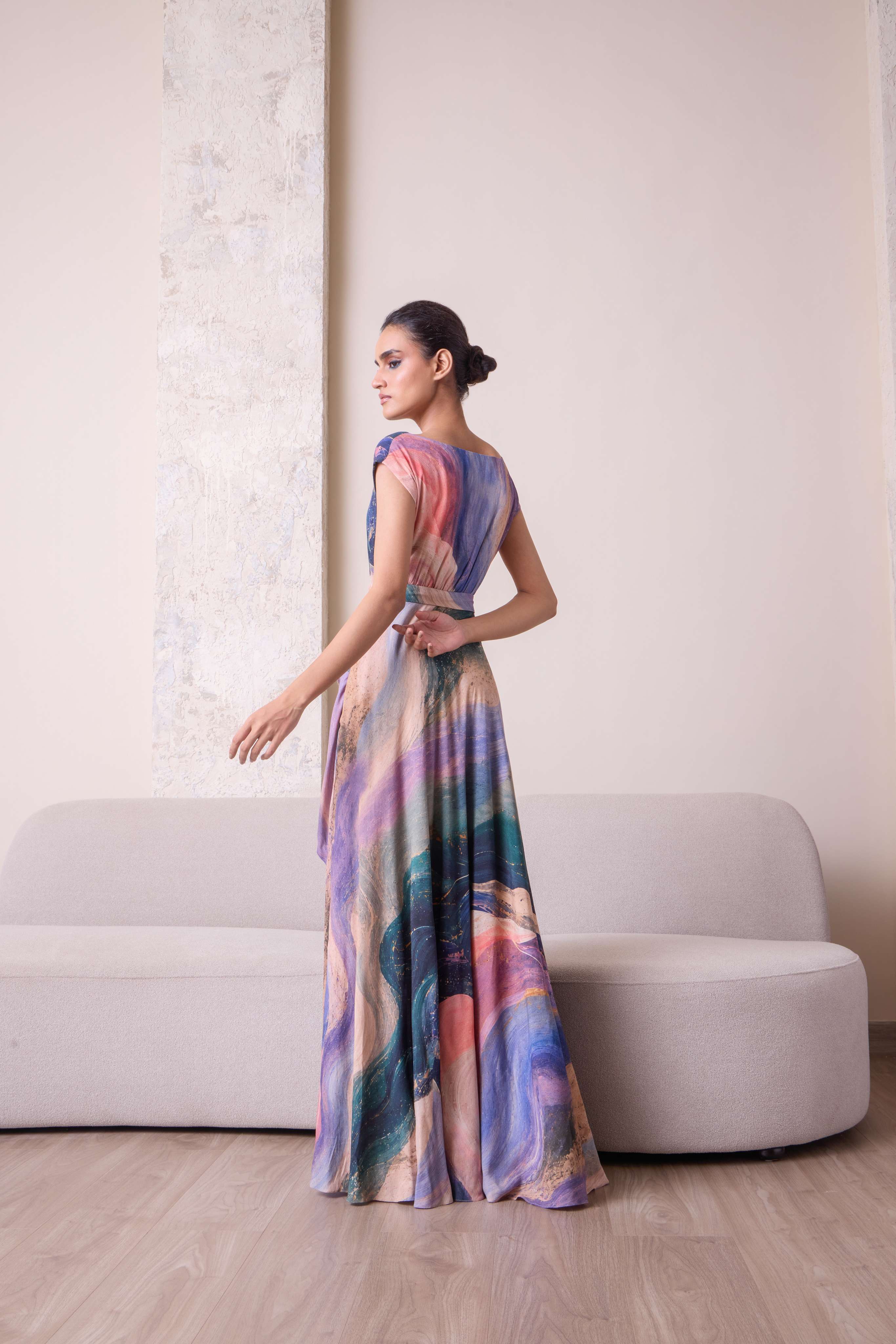 Elegant Celestial Waist-Draped Gown by Simor featuring flowing fabric and intricate detailing, perfect for formal occasions.