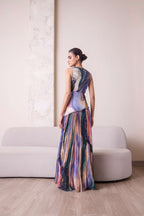 Abstract design maxi dress by Simor featuring a flowing silhouette and vibrant patterns on soft fabric.