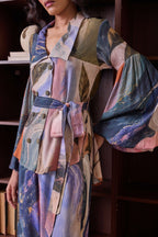 Simor Celestial double-breasted shirt co-ord set featuring a celestial print, collared top and matching high-waisted pants.